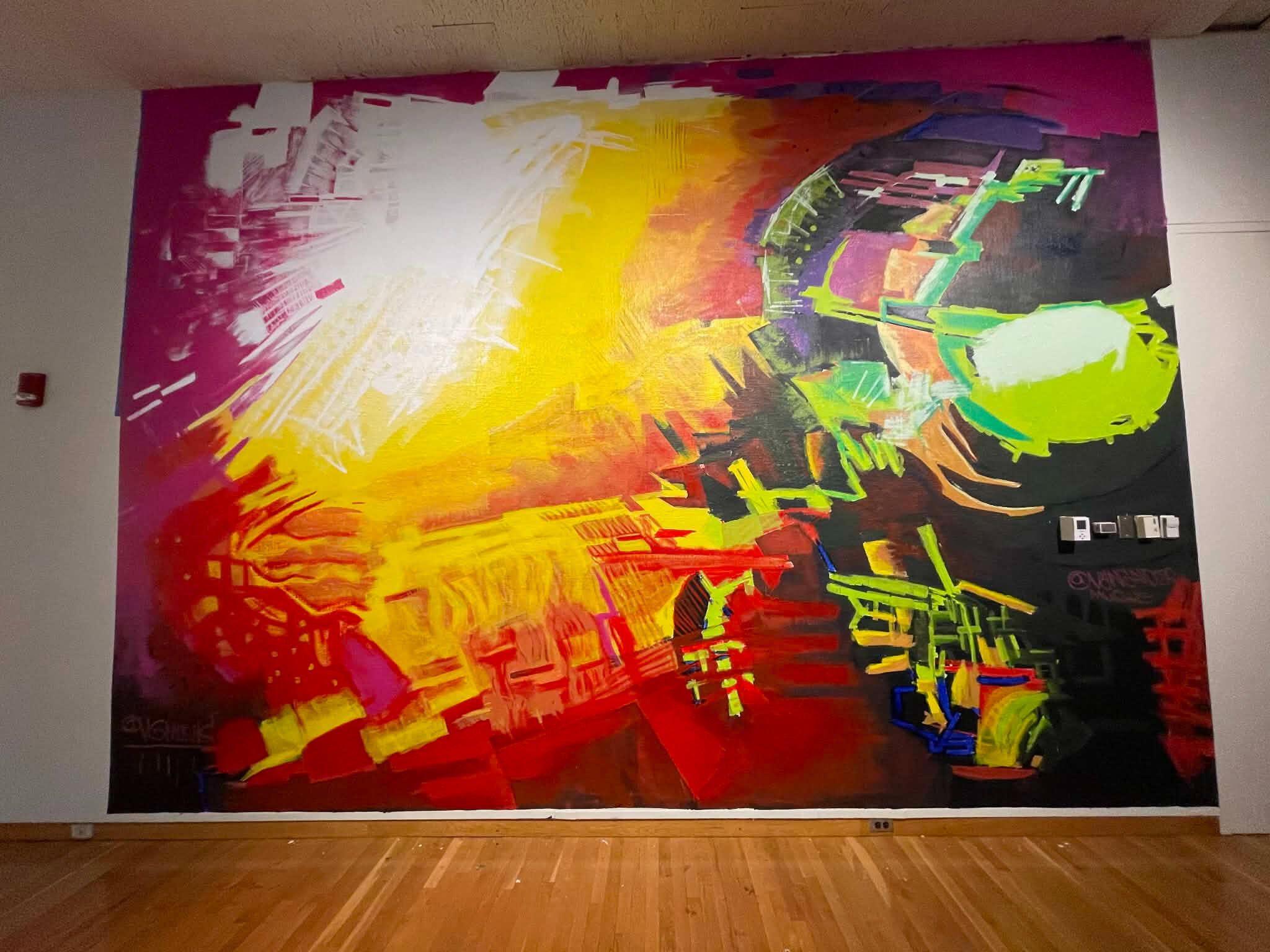 Large-scale 13x18 foot abstract space scene mural exhibited in a fine art museum setting at the Werner Gallery by VanGalder Murals