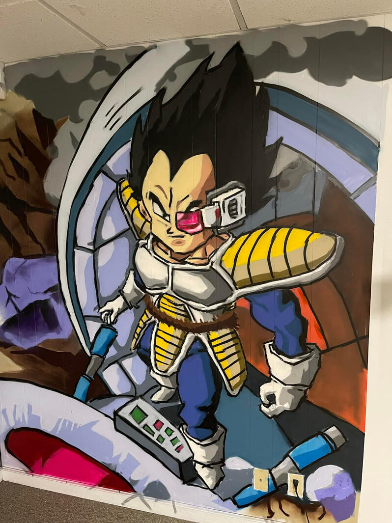 Custom hand-painted residential interior mural featuring Vegeta from Dragon Ball Z emerging from a space pod, designed for a private man cave and gaming room by VanGalder Murals