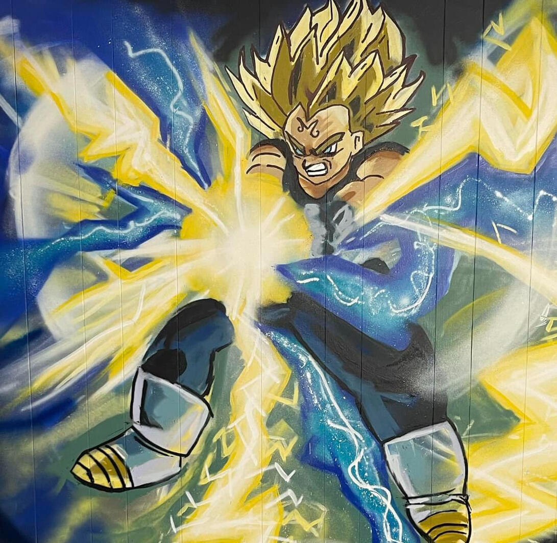 Custom hand-painted residential interior mural featuring a dynamic action shot of Majin Vegeta from Dragon Ball Z firing a glowing energy blast, executed for a private man cave and gaming room by VanGalder Murals